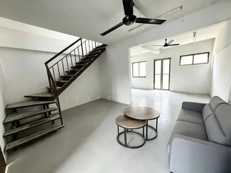 Living features: grey fabric sofa, round coffee table with wooden top, concrete flooring, white painted walls, ceiling fan, 2 ceiling fans, large windows, staircase with wooden steps and metal railing; style: modern.