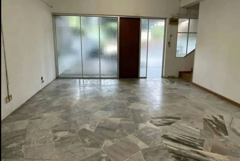 Living features: marble flooring, white painted walls, sliding glass door, wooden door, large windows, natural light, staircase visible, open layout.
