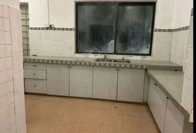 Kitchen features: grey laminate cabinetry, double-bowl stainless-steel sink, chrome faucet, grey countertop, white tiled walls, decorative tile border, tile flooring, large window, under-cabinet storage, built-in drawers.