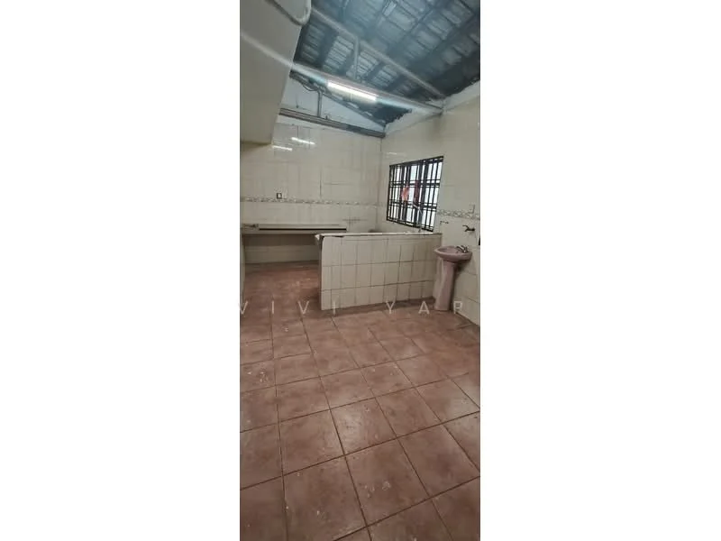 Kitchen features: white tiled walls, brown tiled flooring, single-bowl sink, wall-mounted faucet, countertop with no cabinetry, window with metal grille, pink pedestal sink, exposed ceiling with beams.