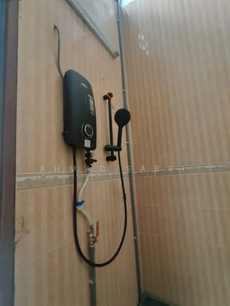 Bathroom features: water heater, shower head, wall-mounted shower control, tiled walls, cream wallpaper, grey tile border, shower hose, plumbing fixtures.