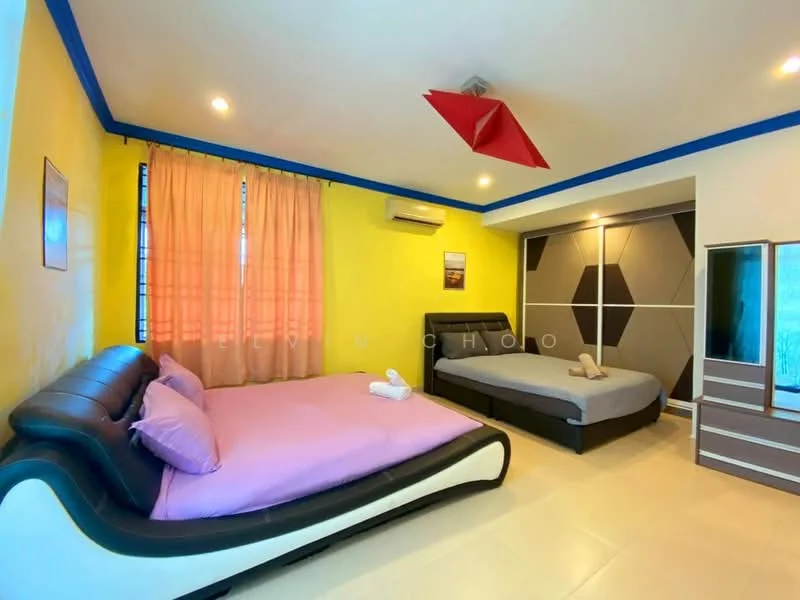 Bedroom features: two beds, queen-size bed with pink bedding, single bed with grey bedding, upholstered headboard, wall-mounted air conditioning unit, yellow painted walls, light-colored tile flooring, curtains in peach color, decorative ceiling light, built-in wardrobe with sliding doors, mirror on wardrobe, geometric wall design; style: modern.