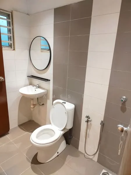 Bathroom features: white tiled walls, grey accent wall, round mirror, wall-mounted sink, chrome basin mixer faucet, one-piece toilet, bidet spray, floor tile flooring, window for natural light, wall-mounted towel holder; style: modern.