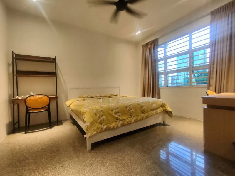 Bedroom features: queen-size bed with yellow floral bedding, wooden study desk, black chair with rattan backrest, floor-to-ceiling windows, white painted walls, polished concrete flooring, curtains in beige, ceiling fan; style: modern; view: garden.