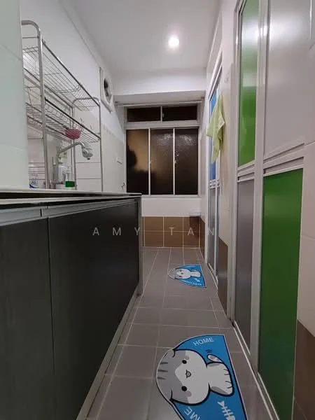 Laundry features: grey cabinetry, white walls, tile flooring, window with grid pattern, laundry sink, metal drying rack, decorative floor mat with animal design, green accent panels on cabinets; style: modern.