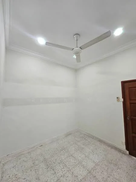 Room features: white painted walls, ceiling with crown moulding, 5-blade ceiling fan with light, terrazzo flooring, wooden door, recessed lighting.
