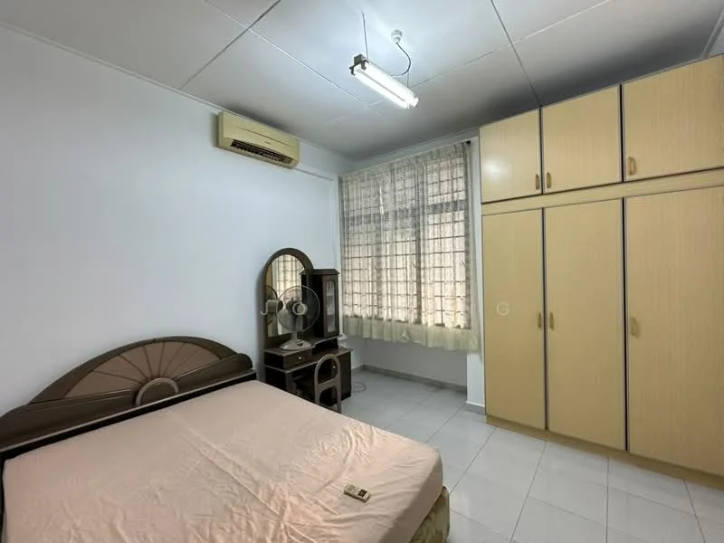 Bedroom features: queen-size bed with beige bedding, built-in wardrobe with sliding doors, mirror on dressing table, white painted walls, tile flooring, curtains on windows, 1 wall-mounted split AC, ceiling light fixture.