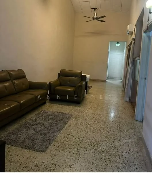 Living features: 3-seater leather sofa in dark brown, 1-seater leather armchair in dark brown, area rug with neutral color, ceiling fan, wall-mounted air conditioning unit, polished concrete flooring, white painted walls, large window with sheer curtains, light fixture in ceiling, open layout; style: modern.