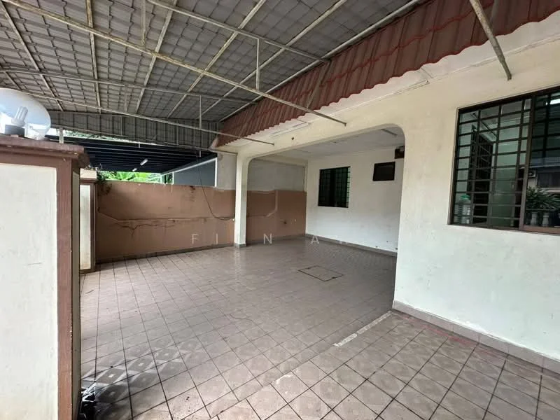 Room features: tiled flooring, white painted walls, exposed ceiling beams, metal roof, large open space, window with metal grills, corner wall with no visible features, outdoor access, covered area.