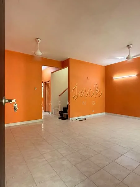 Room features: orange painted walls, ceramic tile flooring, 2 ceiling fans, staircase visible, wall-mounted light fixture, doorway leading to another room, baseboards, no visible furniture.