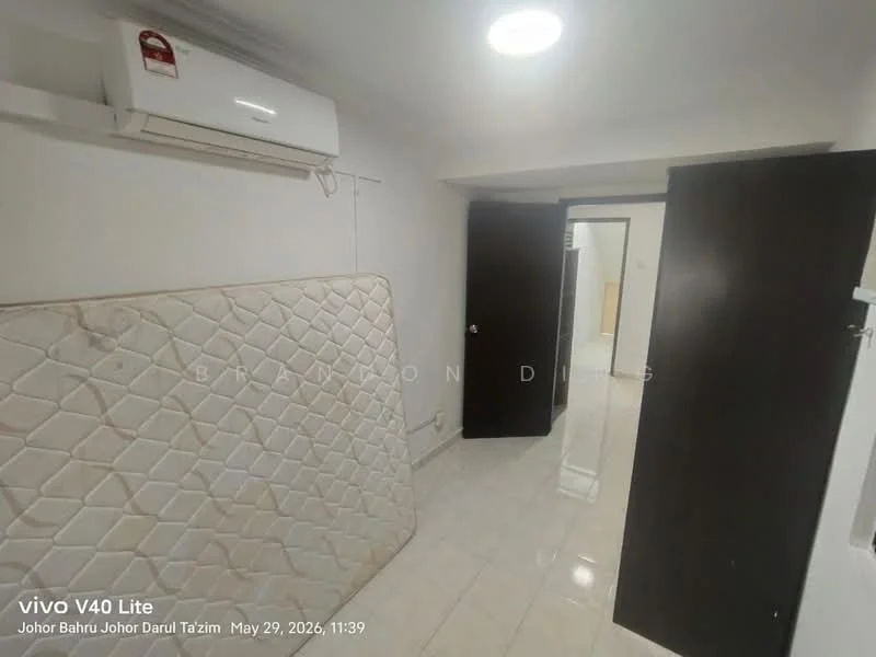 Room features: white painted walls, glossy tile flooring, wall-mounted split AC, single door, double door, mattress on the floor, ceiling light.