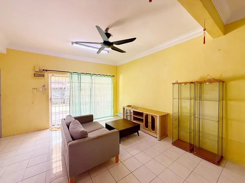 Living features: yellow painted walls, white ceiling with crown moulding, 5-blade ceiling fan with light, sliding glass door, floor-to-ceiling windows, white ceramic tile flooring, grey fabric 3-seater sofa, wood coffee table, wood TV console, glass display cabinet, sheer curtains; style: modern; view: garden.