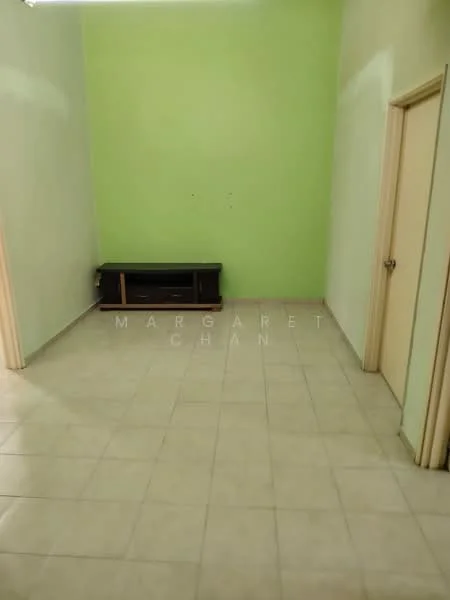 Room features: light green painted walls, cream painted walls, ceramic tile flooring, single wooden door, built-in TV console, neutral ceiling, no visible lighting fixtures.