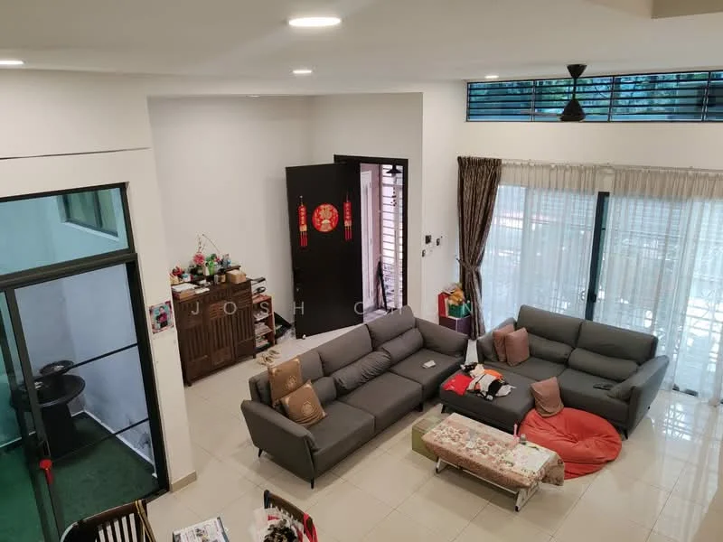Living features: grey fabric L-shape sectional sofa, red bean bag, coffee table, wall-mounted TV, large windows with sheer curtains, white painted walls, recessed downlights, tile flooring, decorative wall art, open layout, entrance door, wooden cabinet; style: modern; view: garden. Room features: green wall with decorative items, door leading to outdoor area.