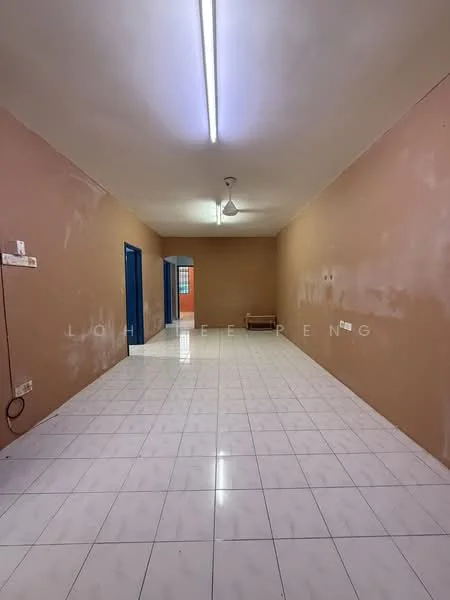 Room features: white tiled flooring, cream painted walls, fluorescent ceiling lights, ceiling fan, blue doors, empty space, no visible furniture.