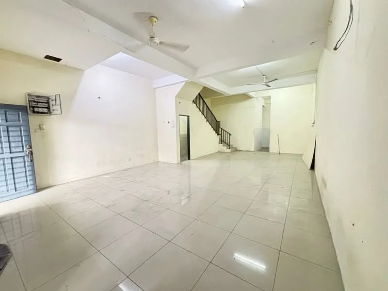 Room features: white painted walls, polished ceramic tile flooring, ceiling fan, staircase, doorway to another room, large open space, multiple light fixtures, no visible furniture; style: minimalist.