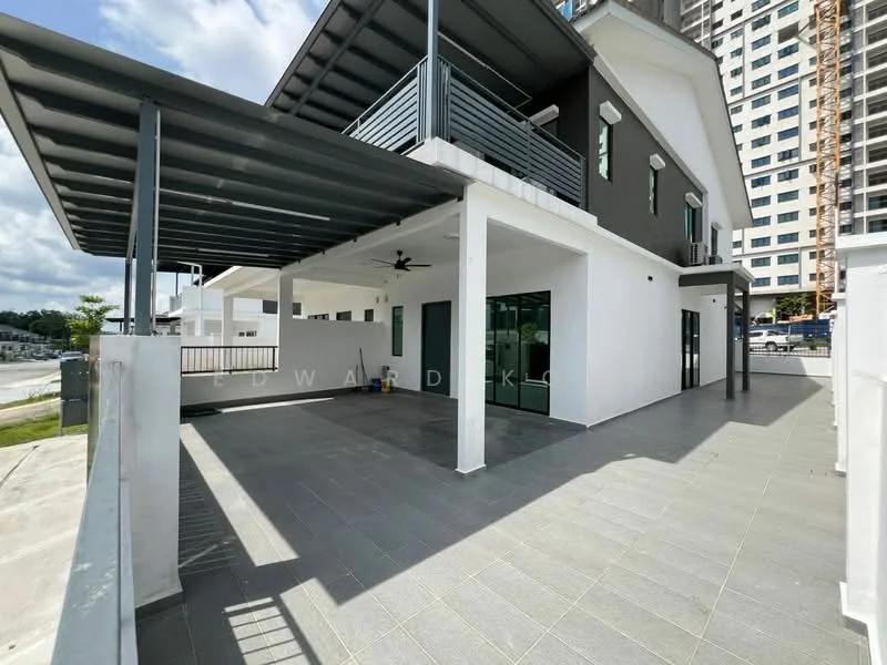 Exterior type: detached bungalow; features: flat roof, white painted facade, grey accent wall, large glass sliding doors, floor-to-ceiling windows, covered terrace area, outdoor ceiling fan, grey tiled flooring, manicured lawn, surrounded by greenery, parking area visible, urban context with nearby buildings; style: modern.