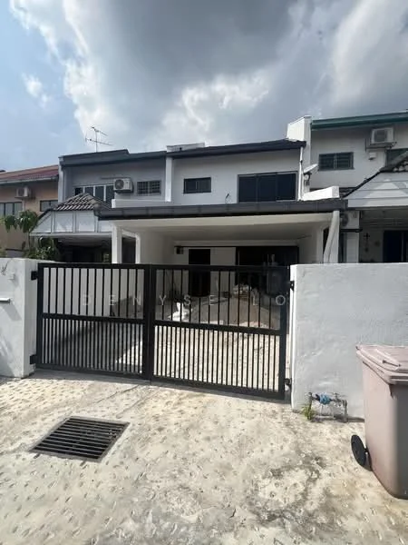 Exterior type: linked terrace house; features: black metal gate, white painted facade, flat roof, two-storey structure, front porch area, visible air conditioning units, concrete driveway, manicured landscaping, windows with grilles, outdoor space with unfinished area; style: modern.