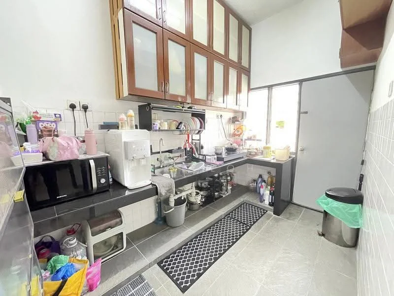Kitchen features: white tiled walls, grey floor tiles, wooden upper cabinets with glass panels, black countertop, stainless-steel sink, chrome faucet, microwave, black fridge, kitchen appliances on countertop, trash bin, plastic storage containers, window with natural light, door leading outside; style: modern.