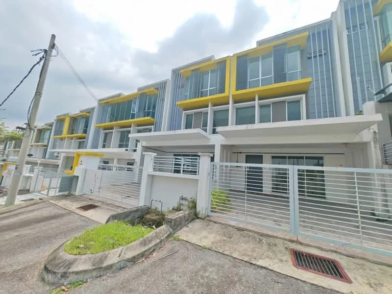 Exterior type: linked terrace house; features: modern facade with yellow accents, multiple storeys, glass windows, metal railings, concrete structure, driveway with interlocking pavers, manicured lawn, fenced perimeter, street lighting, surrounded by greenery; style: modern.