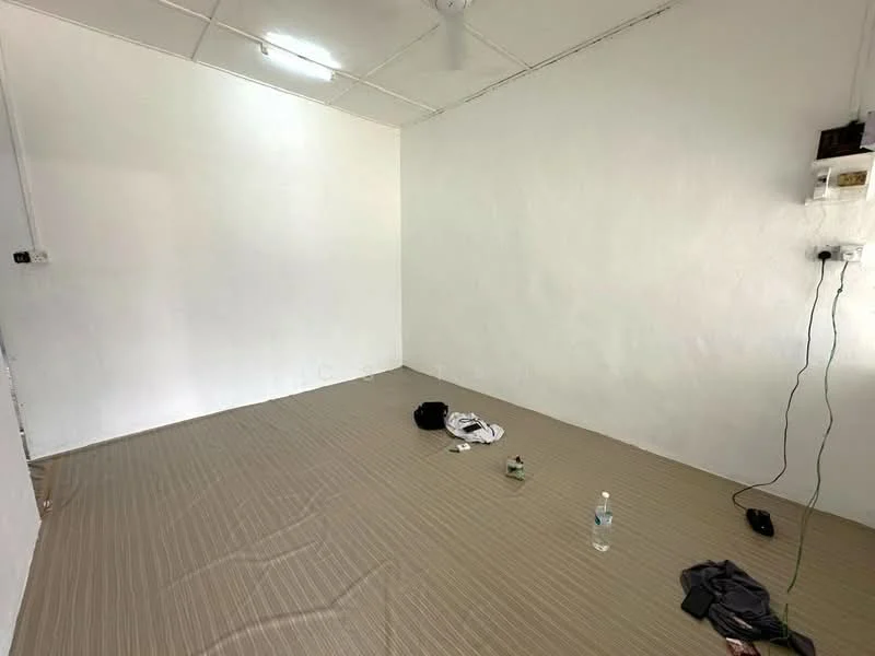 Room features: white painted walls, plain ceiling, vinyl flooring, 1 ceiling fan, no visible furniture, minimal decor, empty space, electrical outlets visible; style: minimalist.
