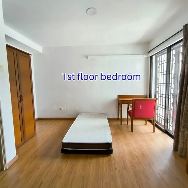 Bedroom features: wooden flooring, white painted walls, large window with grid pattern, curtains, single mattress on bed frame, wooden desk, red upholstered chair, built-in wardrobe; style: minimalist.