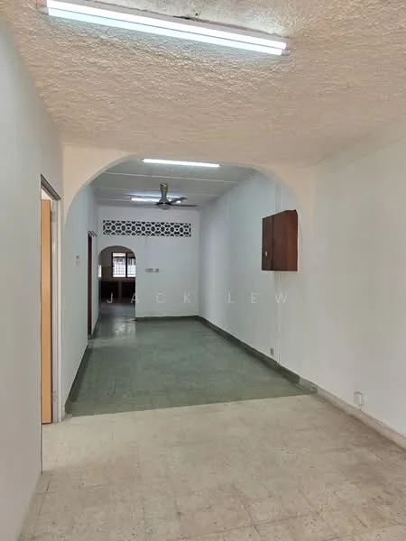 Room features: white painted walls, textured ceiling, green tiled flooring, fluorescent ceiling lights, arched doorway, wooden door, built-in wooden cabinet, ceiling fan; style: minimalist.
