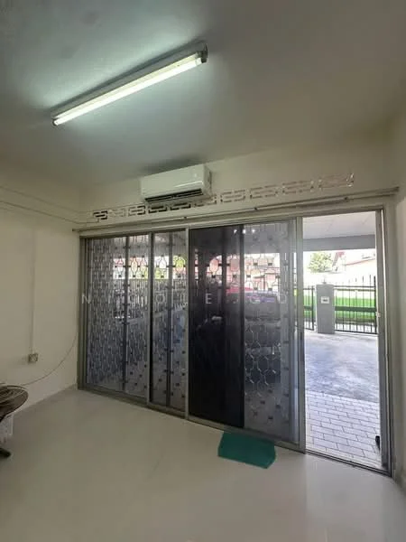 Room features: white painted walls, tile flooring, sliding glass door with security grille, wall-mounted split AC, LED ceiling lights, green mat on floor.