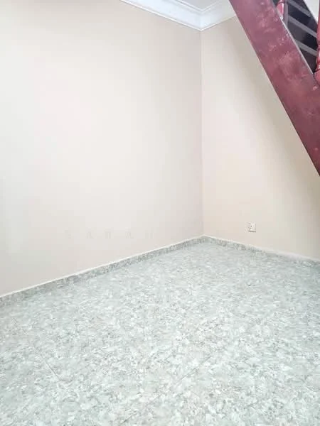 Room features: light beige painted walls, grey marble tile flooring, crown moulding, staircase visible in corner.