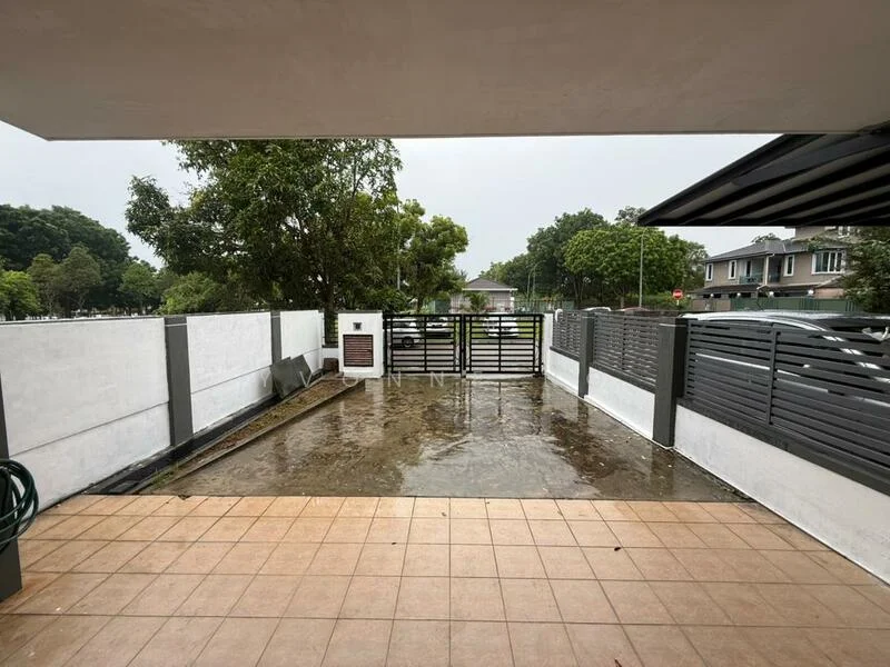 Exterior type: linked terrace house; features: paved driveway, fenced perimeter, manicured landscaping, concrete wall, metal gate, covered porch, tile flooring, surrounded by greenery; style: modern.