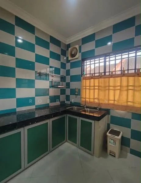 Kitchen features: black granite countertop, green cabinetry, blue and white checkered wall tiles, single-bowl stainless-steel sink, chrome faucet, window with yellow curtain, exhaust fan, white tiled flooring, trash bin; style: modern.