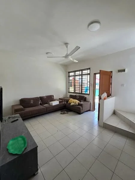 Living features: light-colored painted walls, white ceiling, 5-blade ceiling fan, L-shape sectional sofa in brown, coffee table, TV console, tile flooring, large window with horizontal bars, staircase leading to another level, door leading outside; style: modern.