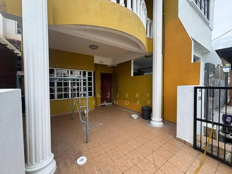Exterior type: linked terrace house; features: yellow painted facade, white columns, tiled flooring, front porch area, main entrance door, window with security bars, fenced area, outdoor lighting fixture; style: modern.