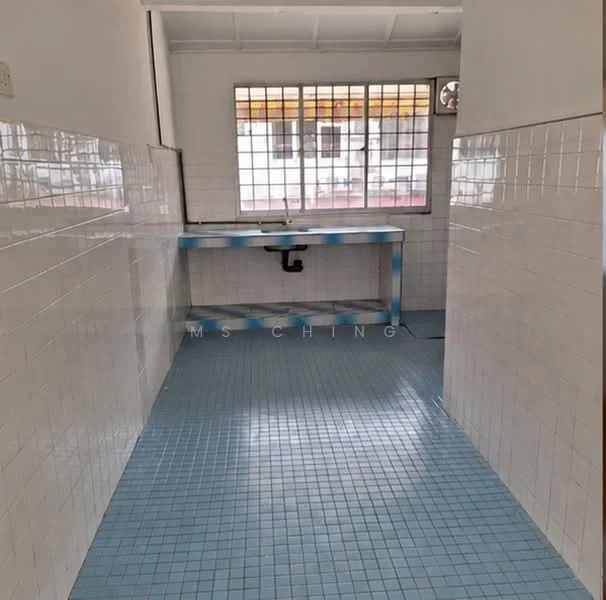 Room features: white tiled walls, blue tiled flooring, window with grid pattern, sink with plumbing, ceiling with exposed beams, wall-mounted air conditioning unit.