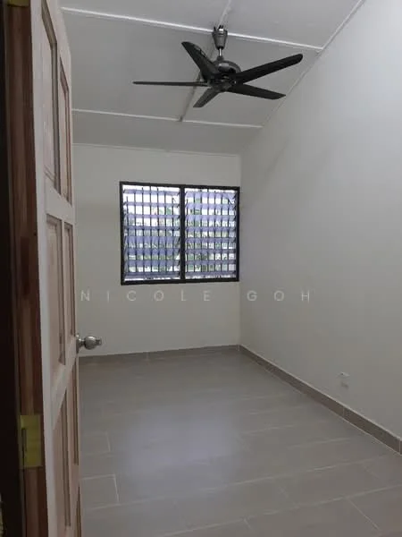 Room features: white painted walls, grey tile flooring, 5-blade ceiling fan, window with security bars, single door, corner of room visible.