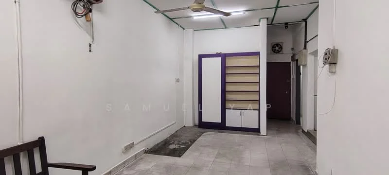 Room features: white painted walls, grey tiled flooring, ceiling fan, built-in shelving unit with purple accents, doorway leading to another room, wall-mounted air conditioning unit, light fixture on ceiling, exposed electrical wiring; style: minimalist.