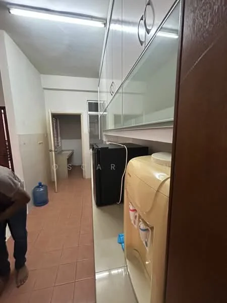 Laundry features: white cabinetry, black refrigerator, water dispenser, countertop, tile flooring in terracotta color, wall-mounted shelves, light fixtures, doorway to adjacent room.