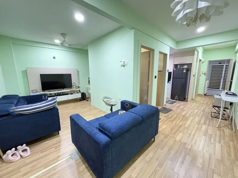 Living features: blue fabric sofa, 3-seater sofa, wooden flooring, light green painted walls, wall-mounted TV, TV console, ceiling fan, recessed lighting, decorative pendant light, open layout to hallway, area rug, decorative items on console; style: modern. Hallway features: wooden flooring, light green painted walls, doorways to other rooms, recessed lighting; style: modern.