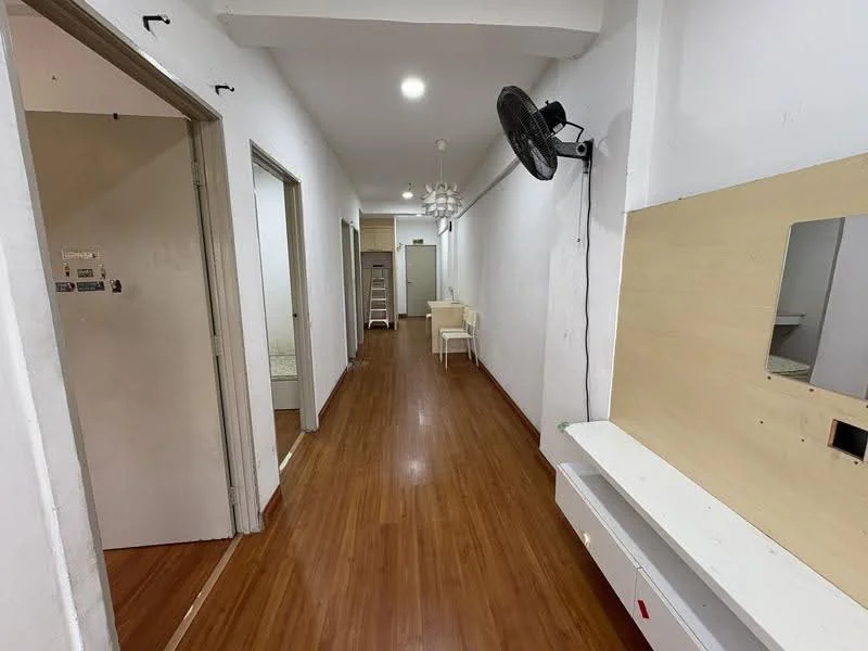 Hallway features: laminate wood flooring, white painted walls, recessed downlights, ceiling fan, wall-mounted mirror, built-in console table, doorways leading to other rooms, ladder visible in the background; style: modern.