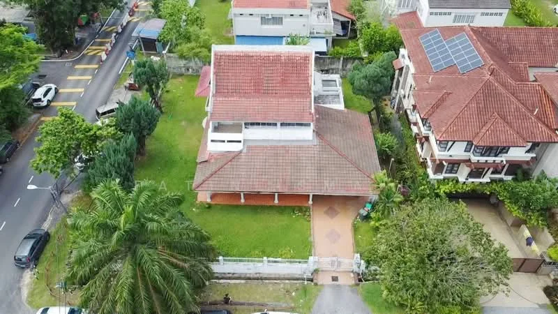 Exterior type: detached bungalow; features: red tile roof, manicured lawn, mature trees, paved walkway, surrounded by greenery, single-storey, driveway with interlocking pavers; style: traditional.