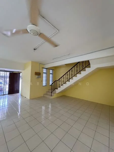 Living features: yellow painted walls, white tiled flooring, 5-blade ceiling fan, staircase with metal railing, large windows, double wooden doors, open layout, natural light.