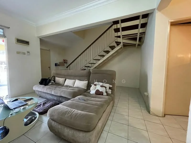 Living features: L-shape sectional sofa in beige, glass coffee table, tile flooring, white painted walls, staircase with wooden railing, wall-mounted air conditioning unit, decorative wall art, natural light from window; style: modern.