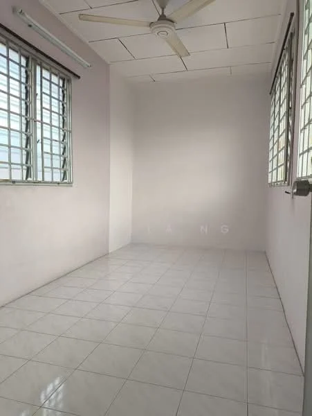 Room features: white painted walls, white tiled flooring, ceiling fan, two windows with metal grilles, no visible furniture or decor; style: minimalist.