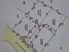 Floor plan: features: layout diagram, property boundaries marked, dimensions indicated, labelled sections, road access shown, land use designations.