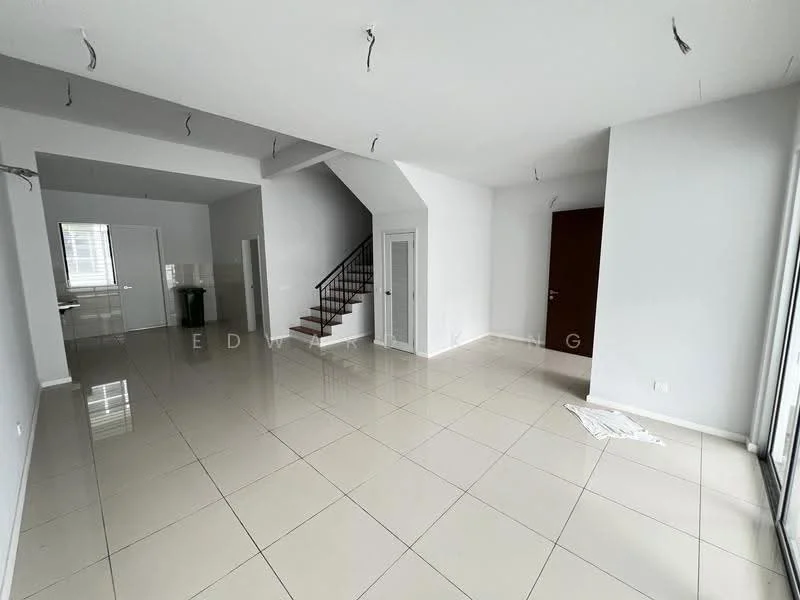Room features: white painted walls, glossy ceramic tile flooring, staircase with metal railing, large windows allowing natural light, open layout, no visible furniture, ceiling with exposed wiring, doorway leading to another room; style: modern.