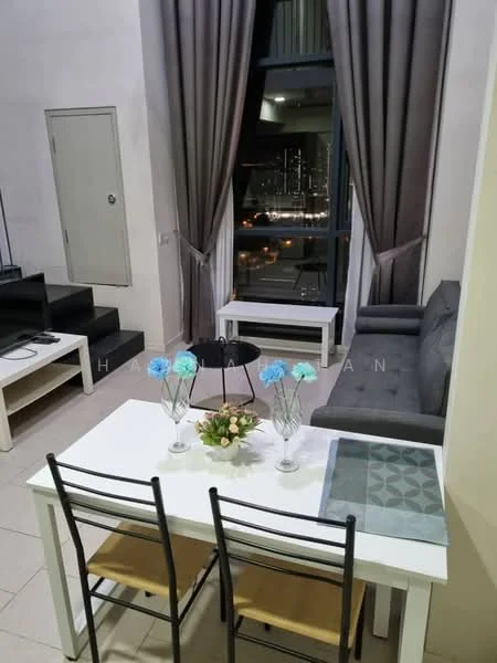 Living features: grey fabric sectional sofa, white coffee table, black TV console, floor-to-ceiling windows, sheer curtains, dark curtains, decorative flowers in vases, dining table with 2 chairs, area rug with geometric pattern, wall-mounted TV; style: modern; view: city.