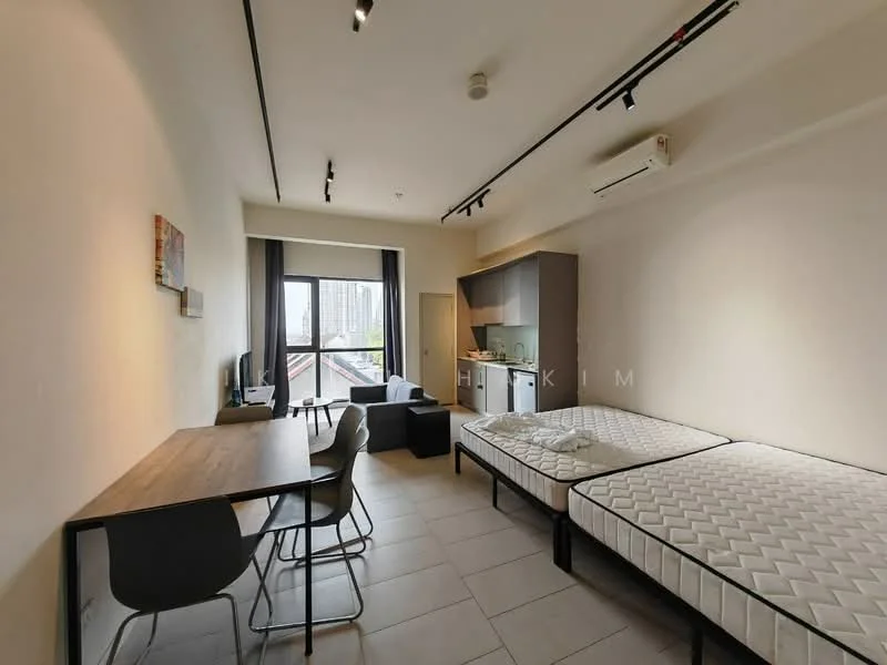 Room features: two single beds with mattresses, grey fabric sofa, wooden dining table, grey dining chairs, kitchenette with upper and lower cabinets, stainless-steel sink, built-in stove, refrigerator, floor-to-ceiling window, curtains, air conditioning unit, light fixtures on ceiling, tile flooring, neutral painted walls; style: modern; view: city.
