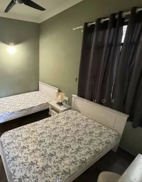Bedroom features: two single beds with floral-patterned bedding, white wooden bed frames, nightstand with lamp, green painted walls, dark wood flooring, ceiling fan, blackout curtains, window with natural light; style: modern.