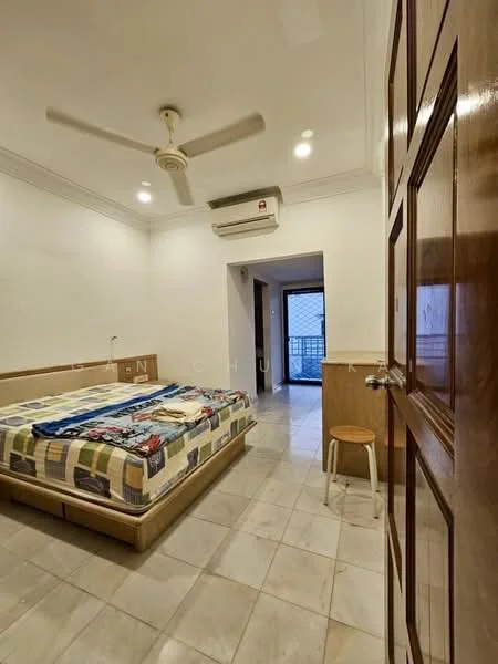 Bedroom features: queen-size bed with patterned bedding, wooden headboard, ceiling fan, wall-mounted split AC, marble flooring, white painted walls, window with view to balcony, wooden door, small stool.