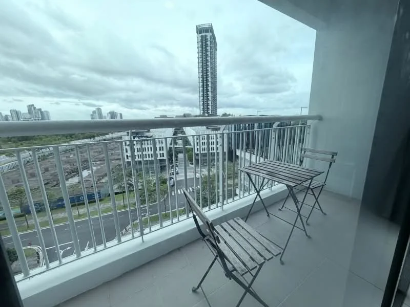 Balcony features: metal railing, two wooden folding chairs, small wooden table, tiled flooring, city view, overcast sky; style: modern; view: city.